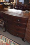 Victorian mahogany bow front chest of two short over three long drawers with turned knob handles,