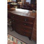 Victorian mahogany bow front chest of two short over three long drawers with turned knob handles,