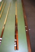 The Embassy Powerglide cue and a Mannock de luxe cue, largest 148cm long (2)