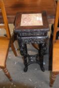Chinese hardwood marble inset plant stand of square form with extensive carved detail and four