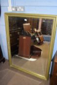 Large 20th century bevelled wall mirror in a gilt finish frame, 131cm high