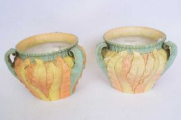 Pair of late 19th/early 20th century Royal Worcester jardinieres with relief moulded designs (2),