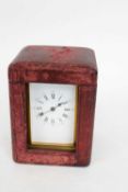 Late 19th century French brass carriage clock with white enamel dial and Roman numerals, in original