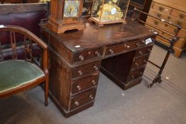 Victorian dark wood twin pedestal desk with nine drawers with small turned knob handles, 123cm wide