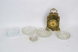 Quantity of cut glass ashtrays, clock in onyx case and a commemorative paperweight with image of