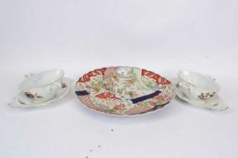 Pair of Continental porcelain tureens and a Japanese Imari charger (3)