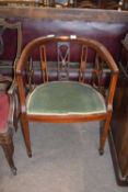 Edwardian mahogany framed and inlaid bow back armchair with green upholstered seat, 53cm wide