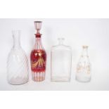 Group of decanters including a Regency example with ruby and gilt decoration, further small 18th/