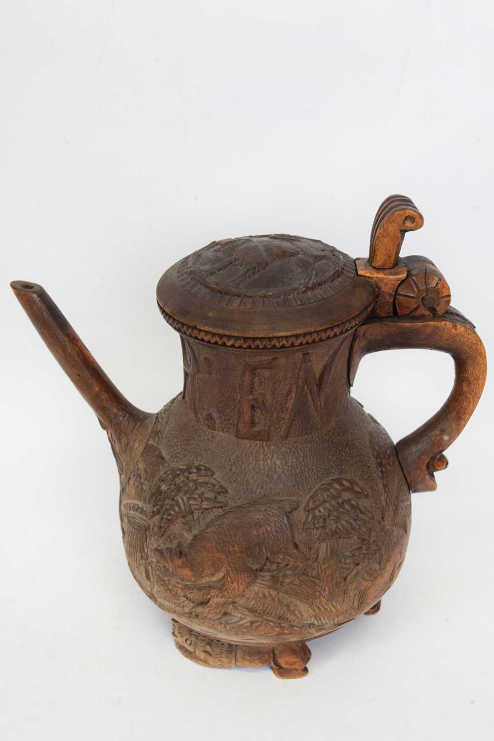 An unusual European, probably Black Forest, wooden coffee pot, probably for marriage, the neck