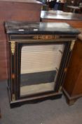 Victorian ebonised inlaid and metal mounted pier cabinet with single glazed door raised on a