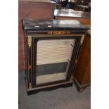 Victorian ebonised inlaid and metal mounted pier cabinet with single glazed door raised on a