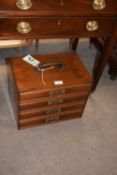 Late 19th/early 20th century four drawer table top chest with metal carrying handle, 38cm wide