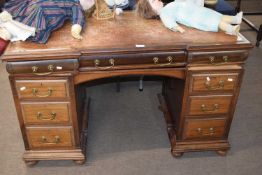 Victorian mahogany twin pedestal desk with tooled leather top and nine drawers with brass swan