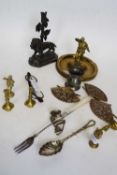 Quantity of brass ashtrays and other implements including a lifeboatman, small pewter mugs, copper