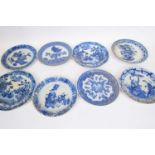 Group of eight Chinese porcelain blue and white plates, all with Kangxi type designs (some damage)