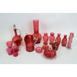 Group of late 19th century/early 20th century cranberry glass wares with various applied designs and