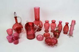 Group of late 19th century/early 20th century cranberry glass wares with various applied designs and