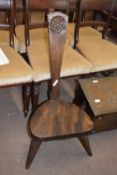 Jack Grimble of Cromer, oak high back spinning chair, carved with Tudor rose detail, 83cm high