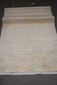 Contemporary beige floor rug 145 x 100cm