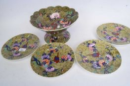Quantity of 19th century Spode wares with a parrot and floral design comprising a centrepiece with