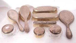 Mixed Lot: silver backed dressing table wares to include six brushes, hand mirror and glass jars, (