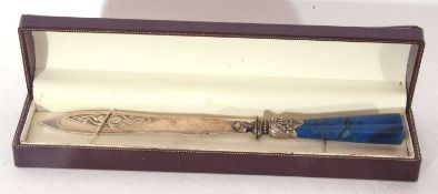 Cased decorative paper knife, the engraved blade to a blue quartz tapered handle, 23cm long