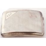 George V silver cigarette case of rectangular curved form, engine turned decoration around a