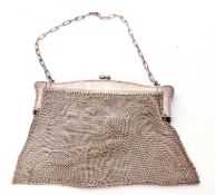White metal or plated meshwork evening bag of typical form with suspension chain, no maker's marks