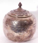 Antique silver plated Hukin & Heath biscuit barrel of globular form, chased and engraved all over in