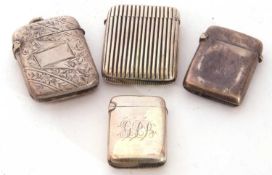 Four various silver vesta cases of hinged rectangular form in a variety of designs and sizes,