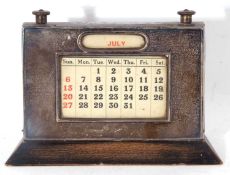 George V silver framed perpetual calendar, Birmingham 1929, maker's mark W J Myatt & Co, 14 x 10cm