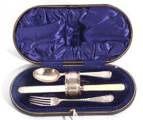 Cased christening set comprising a Victorian fork and spoon, London 1889 and Sheffield 1888, a