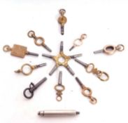 Ten individual watch keys and a pocket watch key star, one of the keys engraved with H Samuel of