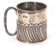 Edwardian christening tankard of cylindrical form with half-wrythen fluting and embossing, hollow