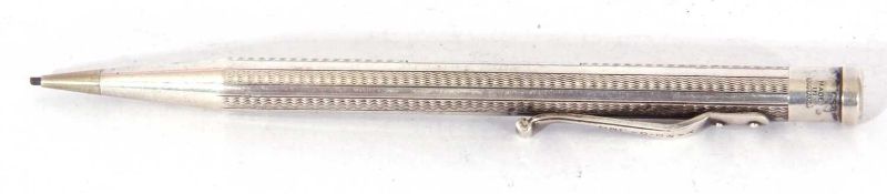 Rolled silver propelling pencil decorated with engine turned detail