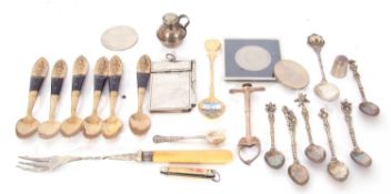 Mixed Lot: quantity of metal small spoons including Siamese bronze examples, plated sugar nips and