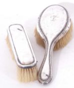 Mixed Lot: embossed silver backed hair brush engraved with the letter 'L', Birmingham 1922, and a