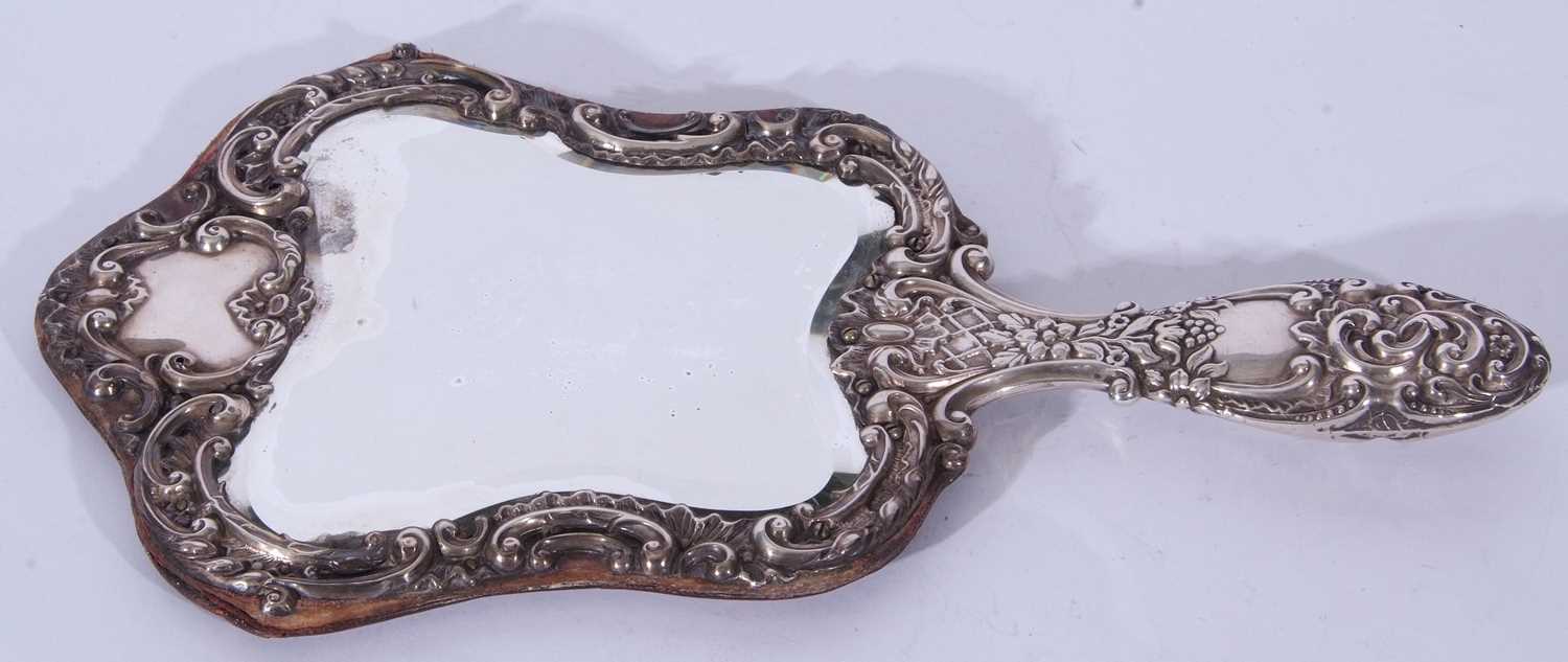 Late Victorian silver mounted dressing table hand mirror, the bevelled mirror surrounded by - Image 3 of 3