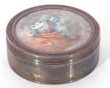 George V import hallmarked circular lidded box with all-over engine turned decoration, the removable