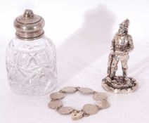 Mixed Lot: a 3d coin bracelet, a cut glass sifter with a pull off pierced silver lid, hallmarked