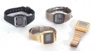 Four quartz digital wrist watches, two being yellow metal Seiko examples, stainless steel Citizen