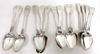 13 Georgian silver Fiddle pattern table spoons and one Victorian example, mixed dates and makers,