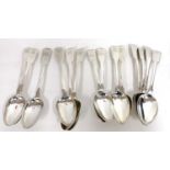 13 Georgian silver Fiddle pattern table spoons and one Victorian example, mixed dates and makers,