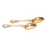 Pair of Victorian silver gilt Kings shape (rococo end) dessert spoons, Birmingham 1866, maker's mark