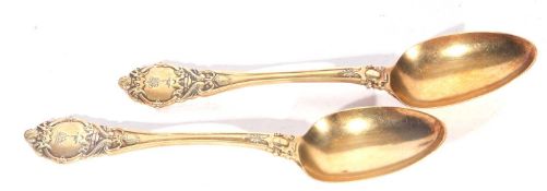 Pair of Victorian silver gilt Kings shape (rococo end) dessert spoons, Birmingham 1866, maker's mark