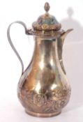 Victorian silver hot water/coffee jug of pear shaped form onto a circular collet foot, the lower