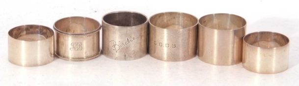 Mixed lot of hallmarked circular napkin rings including a pair, Sheffield 1922, 216gms total (6)