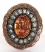 Antique citrine and seed pearl ring, the oval faceted citrine within a small seed pearl surround