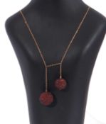 Antique garnet sphere drop necklace, the design with two graduated garnet encrusted spheres