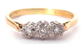 A three stone small diamond ring featuring round single cut diamonds in illusion settings,